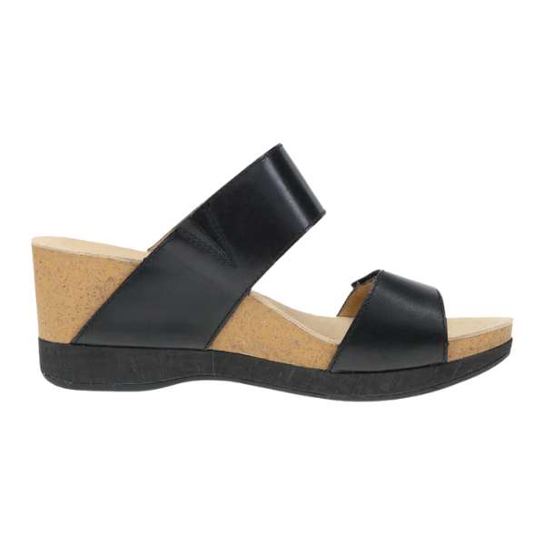 The Dansko Womens Shannon Black Burnished by DANSKO is a black wedge slide sandal with two Wide leather straps, a cork sole, low heel, and open toe for stylish comfort and foot pain relief.