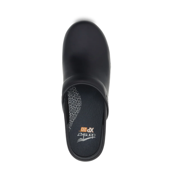 Top view of the Dansko Womens XP 2.0 Black Pull Up slip-on clog by DANSKO, featuring a closed toe, open heel, memory foam cushioning, patterned insole, and Dansko XP 2.0 logo.