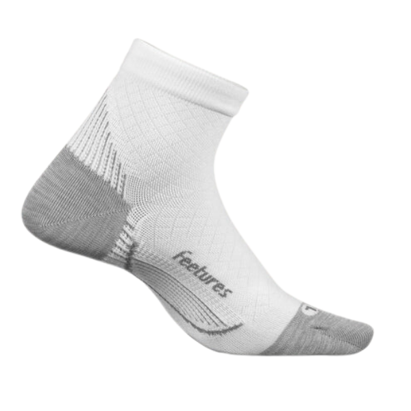 The FEETURES Unisex Plantar Fasciitis Relief Sock Ultra Light Quarter in White/Black features targeted compression for heel and arch pain, with “Feetures” printed on the side, shown against a plain white background.