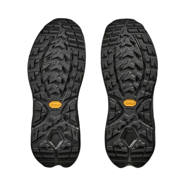 Black rubber sole of a shoe with a brand logo on a white background