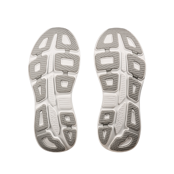 Two HOKA Mens Bondi 9 Wide Navy/White soles, made with Durabrasion rubber, are shown side by side. Their gray and white geometric tread pattern provides traction and plush cushioning for comfortable steps.