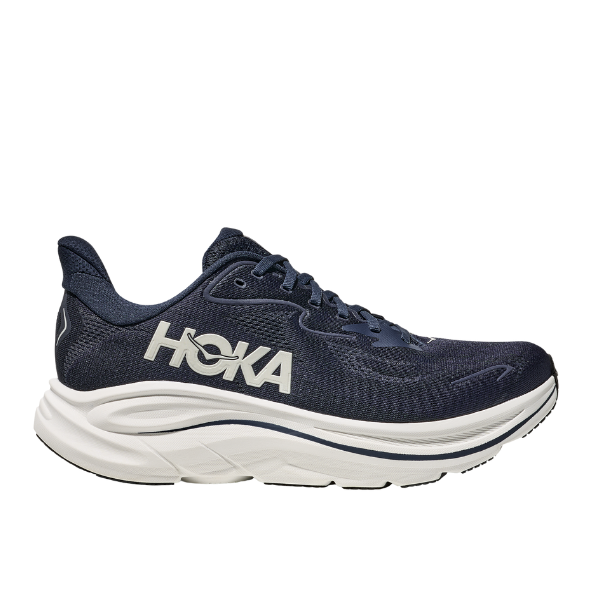 The HOKA Mens Clifton 10 Wide Navy features a white sole and bold white HOKA logo, shown on a plain white background—ideal cushioned running shoes crafted for plush performance.