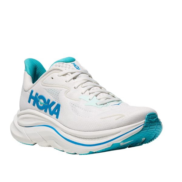 The HOKA Mens Clifton 10 Wide White/Blue running shoe features a thick cushioned sole and mesh upper for comfort and breathability—ideal for those who prefer cushioned running styles.