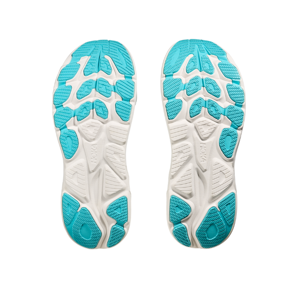 Top view of HOKA Mens Clifton 10 Wide White/Blue running shoes shows cushioned soles with white and blue patterned sections, isolated on a white background.