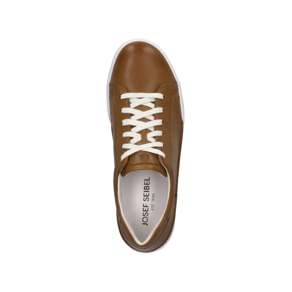 A top view of the Josef Seibel Womens Claire 01 Camel sneaker in brown leather with white laces and a white sole. The insole shows Josef Seibel branding, offering comfort for foot pain relief. Shown on a plain white background.
