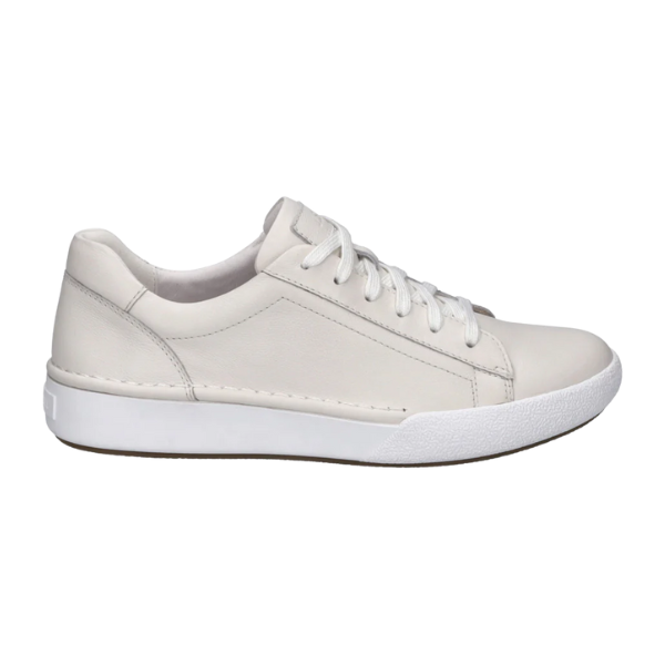 The Josef Seibel Womens Claire 01 White sneakers feature a low-top leather design with white laces, a textured rubber sole, and minimal stitching—comfortable, stylish footwear from Josef Seibel ideal for foot pain relief.