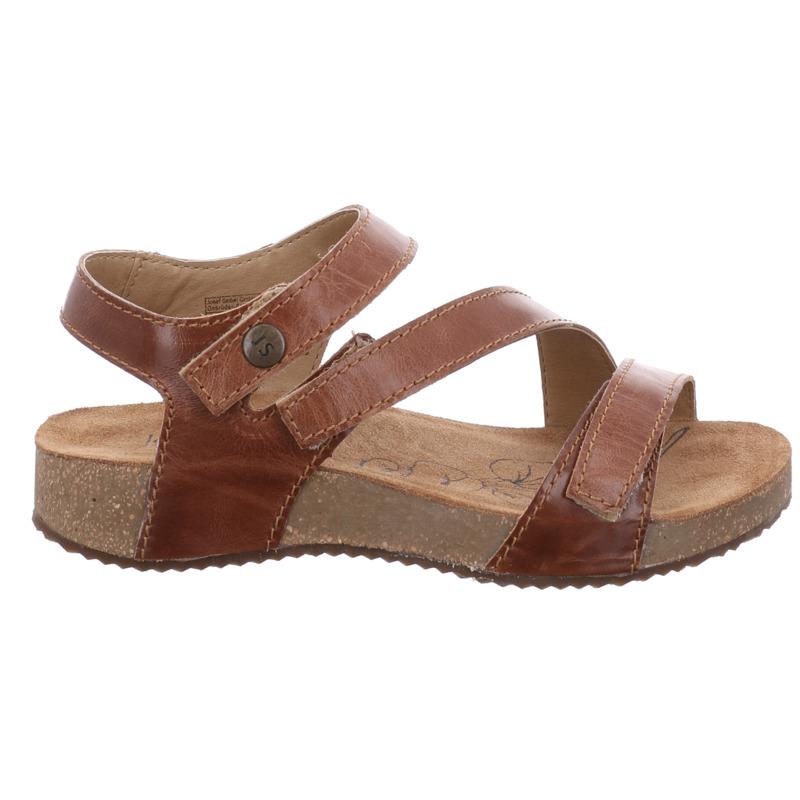 The Josef Seibel Womens Tonga Camel sandal features two adjustable straps, a back strap, cork-textured sole, and slight heel. Designed by Josef Seibel for comfort and casual style, its ideal for plantar fasciitis support.