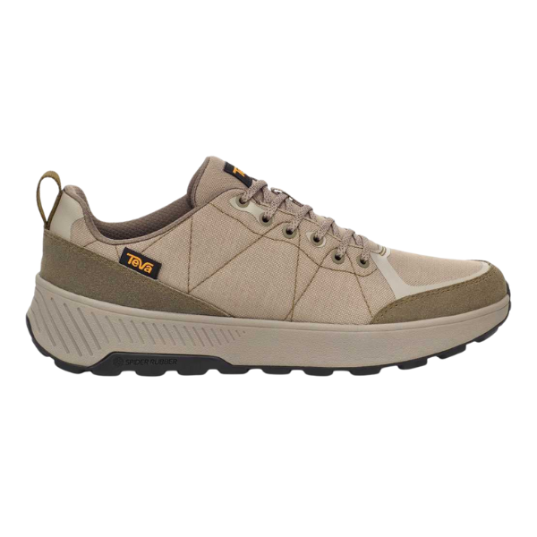 The TEVA Men's Ellwood Taupe Desert hiking sneaker features a beige and tan design, thick textured black sole, lace-up closure, recycled materials, and rugged style—ideal for outdoor activities. Teva logo appears on the side and tongue.
