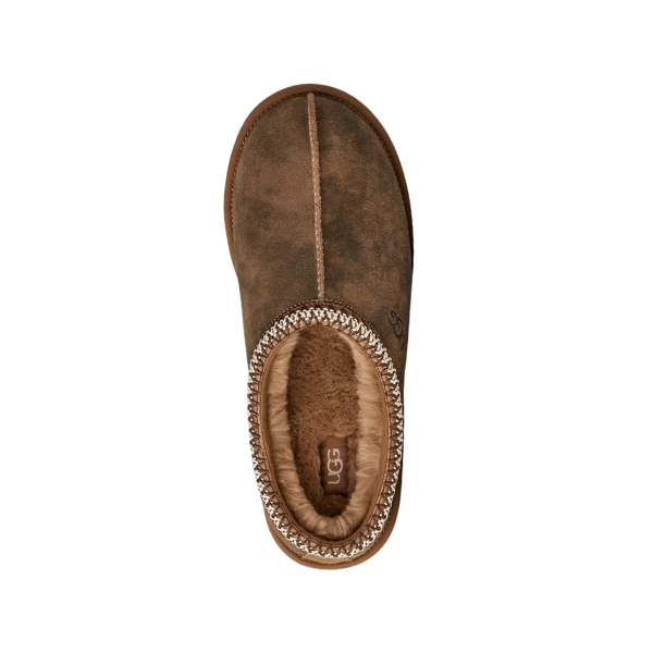 Top view of the UGG Men's Tasman Baxter Chestnut by UGG, showing a brown suede upper, plush lining, patterned trim at the opening, and visible UGG logo on the insole.
