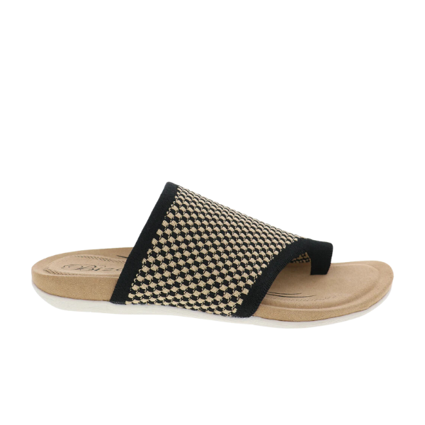 The BIZA FOOTWEAR Biza Womens Lavish Black Multi sandal features a beige and black stretch knit checkered upper, open toe, and cushioned tan sole—ideal for travel—shown on a white background.