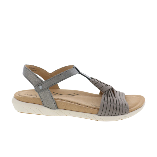 The BIZA FOOTWEAR Biza Womens Kate Bronze is a taupe comfort sandal with a closed back, adjustable Velcro ankle strap, pleated front straps, cushioned tan footbed, and a white textured sole for stylish support.