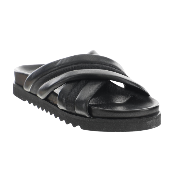 The Sovella Womens Coty Black sandal by SOVELLA features Wide, padded crisscross straps and a cushioned footbed with a textured black sole, delivering comfort and style in a versatile design.