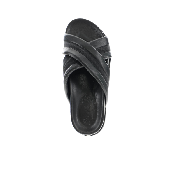 The Sovella Womens Coty Black sandal by SOVELLA features crisscross leather straps and a cushioned footbed, shown from above on a white background—a versatile addition to any wardrobe.