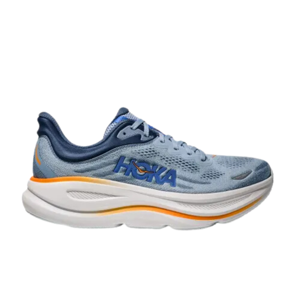 The Hoka Mens Bondi 9 Wide in Drizzle/Downpour features a plush white and orange cushioned sole, dark blue laces, and HOKA branding in blue and orange on the side. The athletic shoe is displayed on a white background.
