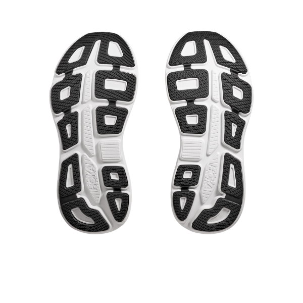 The HOKA Womens Bondi 9 Black/White features black and white soles with ultra-cushioned black textured patterns, white grooves, and geometric-shaped cutouts for traction and foot pain relief.