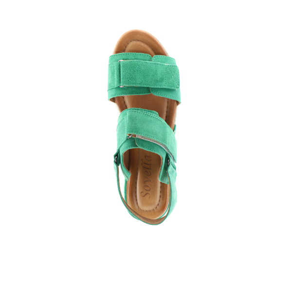 A single Sovella Womens Maya Green sandal with two Wide straps and a back heel strap, viewed from above on a white background. The tan cushioned insole displays the SOVELLA brand name.