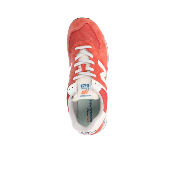 Top view of a red New Balance Unisexs 574 Infield Clay/Sea Salt running shoe with white laces, N logo, and light grey sole on a plain white background. NEW BALANCE design for style and comfort to help reduce foot pain.