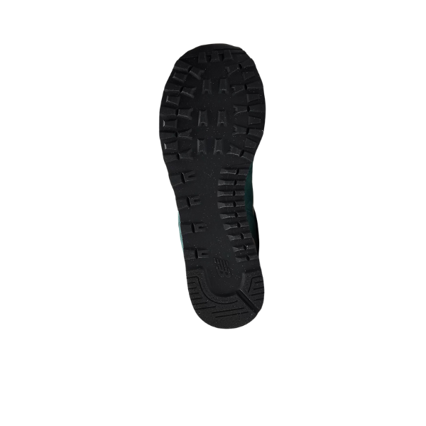 The black rubber sole of the NEW BALANCE Unisexs 574 New Spruce/Sea Salt running shoe is shown from the bottom against a white background, highlighting its tread pattern designed for comfort and reducing foot pain.