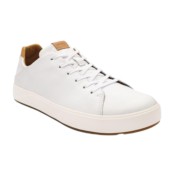 The OLUKAI Mens Lae‘ahi Lī ‘Ili Leather Sneaker in white features white laces, a light brown inner lining, tan heel accent, brown logo tag on the tongue, and a thick white sole with brown outsole for signature comfort and style.