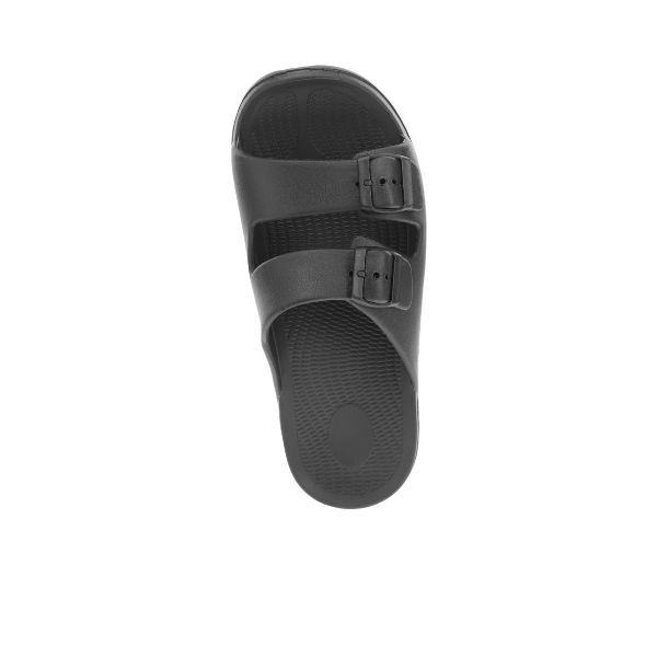 The SOVELLA Sovella Womens Buckle Slide Black features two adjustable straps, arch support for comfort, and a water-friendly design, shown from above on a white background.