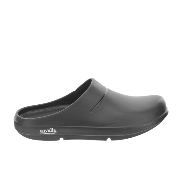 The Sovella Mens Clog Black by SOVELLA features a comfortable slip-on design with a closed toe, open heel, arch support, and the SOVELLA logo on the side of the sole.