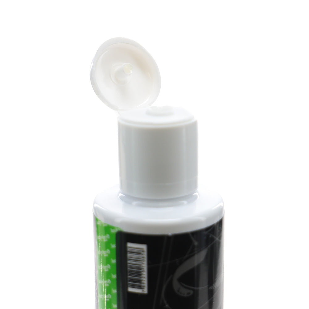 A close-up of the Lfsss02 | Lfs Sneaker Shampoo by LUCKY FEET SHOE with its flip-top cap open, label and barcode visible.