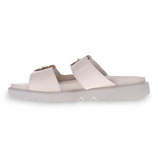 Side view of the REVERE Revere Womens Mermaid Ivory sandal in white premium leather, featuring two Wide straps with gold buckles and a thick ridged sole for minimalist style and comfort.