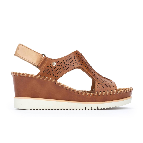 The Pikolinos Womens Aguadulce Brandy wedge sandal by PIKOLINOS features brown leather, a perforated design, white stitching, an open toe, adjustable ankle strap, and a white platform sole for stylish comfort with every step.