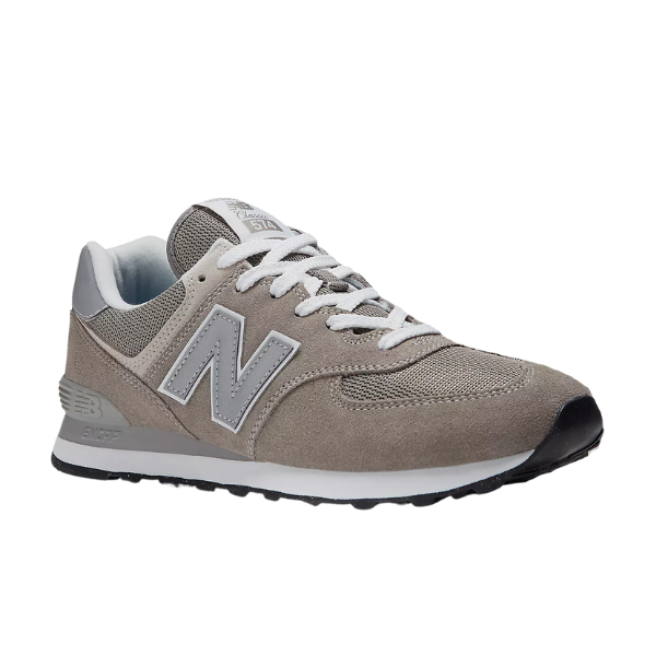 The NEW BALANCE Mens 574 Core Neutral features a gray and white design, large N logo, white laces, mesh and suede accents, and a black rubber sole—timeless mens sneakers shown on a white background.
