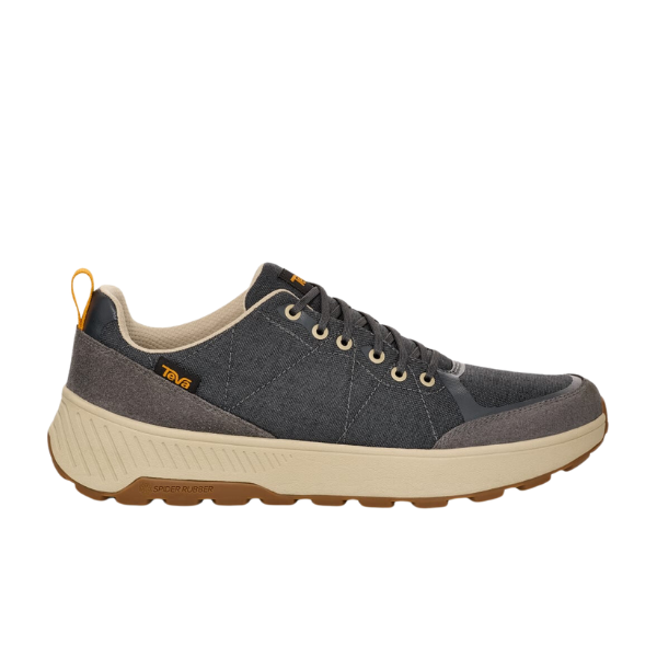 The Teva Mens Ellwood Dark Grey sneaker features tan accents, a beige midsole, brown rubber outsole, and a yellow Teva logo—crafted with recycled materials and shown in profile on a white background.