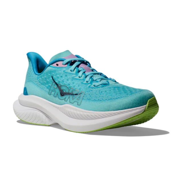 The HOKA Womens Mach 6 (Medium Width) Teal is a stylish running shoe for everyday use, featuring a teal upper, white thick sole, green outsole, black HOKA logo on the side, and light pink and teal accents on the tongue and heel.