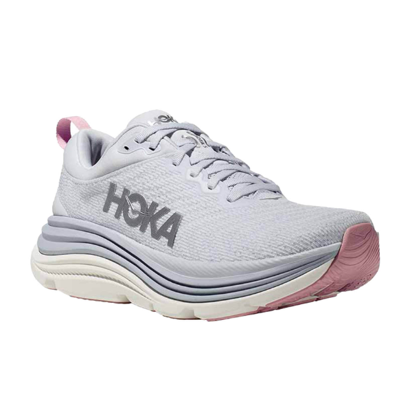 The HOKA Womens Gaviota 5 Wide Grey is a womens running shoe with a light gray upper, thick white and gray wavy sole featuring Stabilizing H-Frame tech, pink outsole and heel tab accents, and a dark gray HOKA logo on the side.