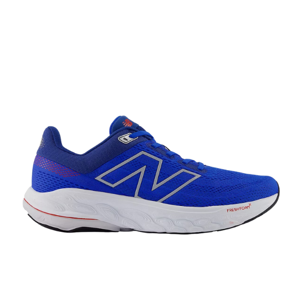 The New Balance Mens Fresh Foam 860v14 Blue features a large silver N logo, mesh upper for breathability, white cushioned sole with Fresh Foam X midsole, black outsole, and red “Fresh Foam” branding near the heel.