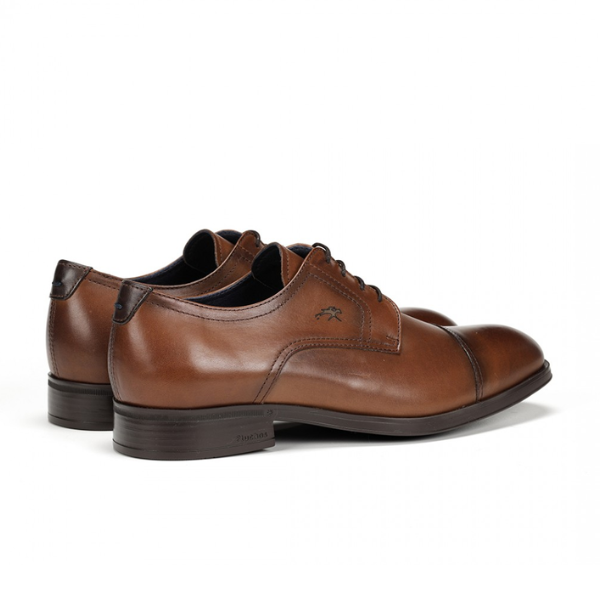 The Fluchos Mens Asgard F1885 Brown by FLUCHOS are brown leather lace-up dress shoes with a cap toe, slight heel, and subtle stitching—ideal for men seeking stylish comfort.