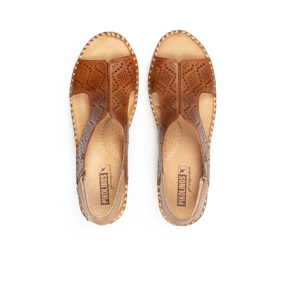 The Pikolinos Womens Aguadulce Brandy sandals by PIKOLINOS feature brown open-toe design, geometric cut-outs, and beige insoles—ideal for foot pain relief and styled for comfort.