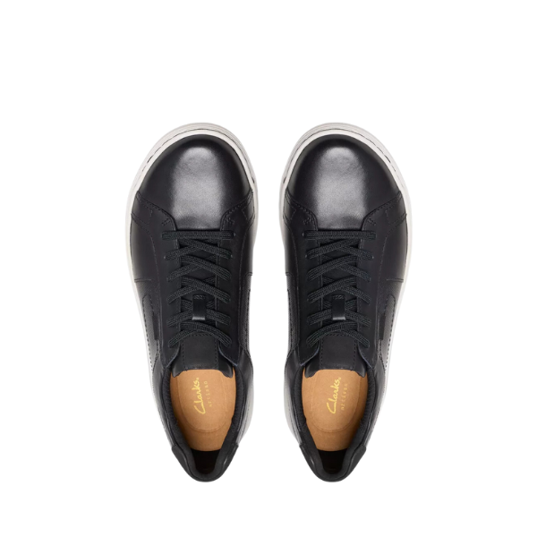 Top view of the Clarks Mens Mapstone Lace Wide sneakers by CLARKS in black/white, featuring black leather uppers, white soles, black laces, tan insoles with the Clarks logo, and a comfort footbed for all-day wear.