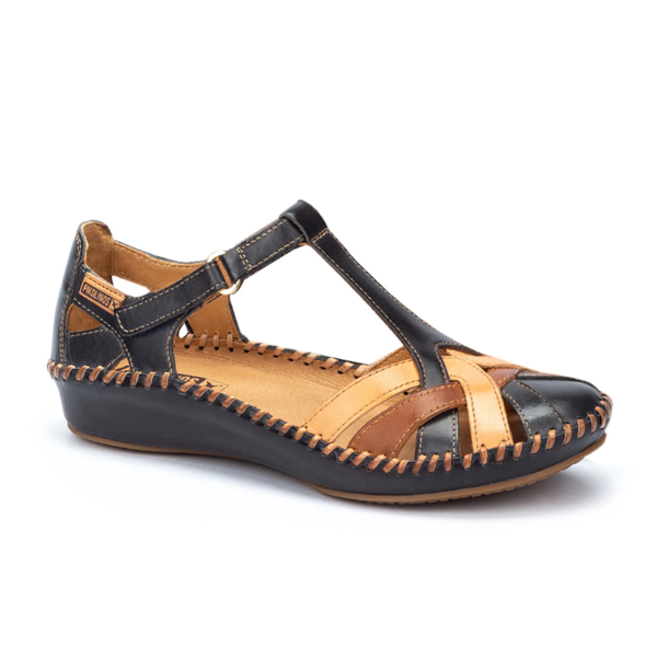 The PIKOLINOS Womens P. Vallarta Navy is a closed-toe sandal with a low wedge heel, T-strap design, and multicolored navy leather panels highlighted by visible edge stitching for comfort and style.