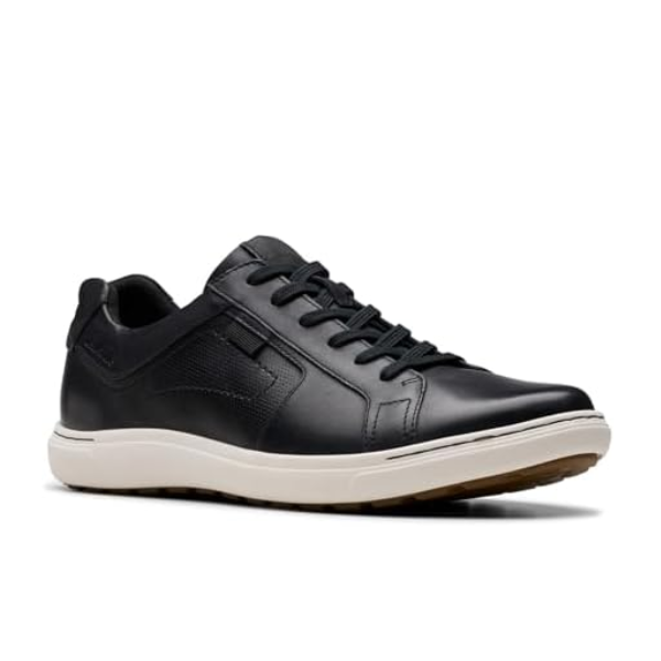 The CLARKS Mens Mapstone Lace Wide Black/White sneaker features black leather, a comfort footbed, white sole, black laces, and subtle stitching details, displayed angled on a white background.