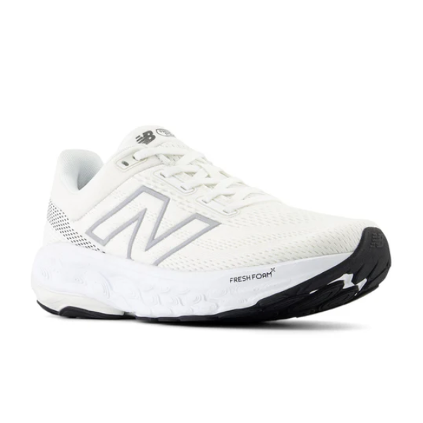 The New Balance Womens Fresh Foam 860v14 White features a gray N logo, white laces, and a black and white rubber sole, with Fresh Foam X cushioning for comfort and support every stride.