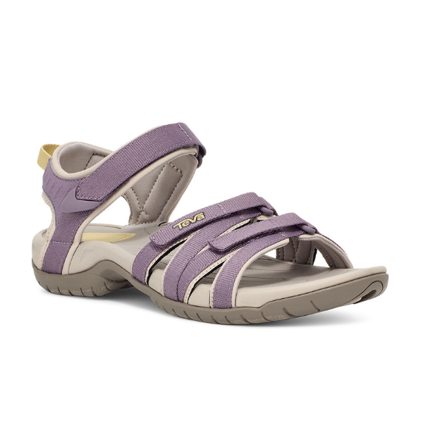 The Teva Womens Tirra in Grey Ridge/Purple features adjustable straps, a rugged sole for outdoor activities, and offers comfort for those with plantar fasciitis.