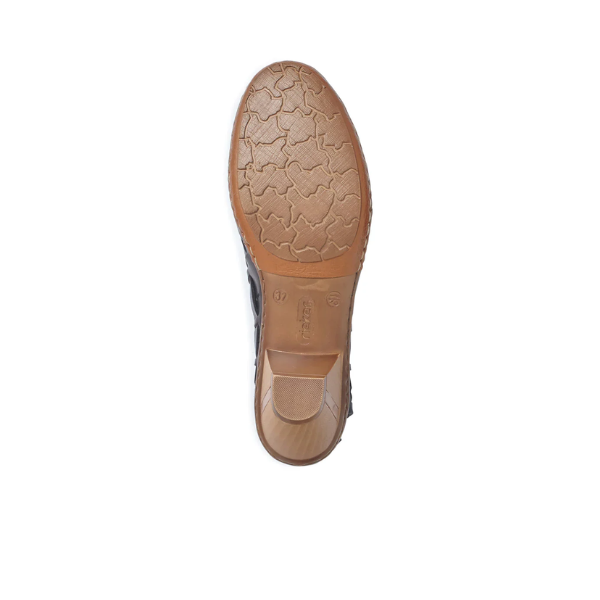 The image shows the bottom view of a RIEKER Womens Sina Weave Black shoe sole with a textured, slightly cracked pattern and a small rectangular heel on a white background.