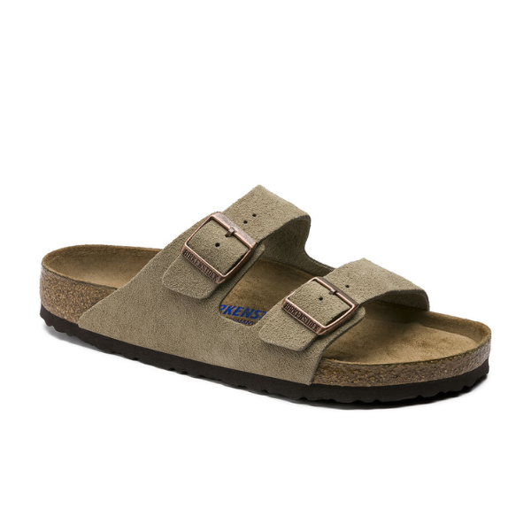 A single BIRKENSTOCK Women's Arizona Soft Footbed sandal in taupe suede, featuring two adjustable buckle straps and a black rubber sole, shown from the side.