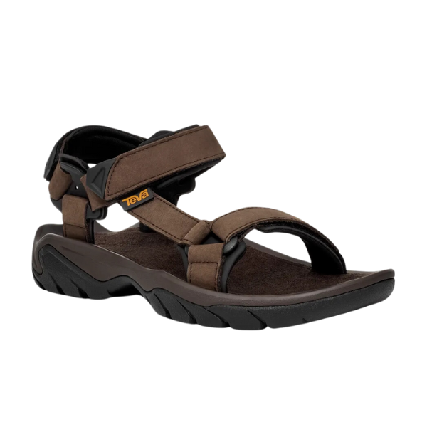 The Teva Mens Terra Fi 5 Universal Leather in Turkish Coffee features adjustable Velcro straps, a rugged sole for outdoor support, and displays the Teva logo on the side strap.