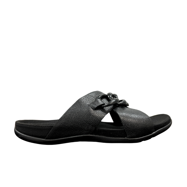 The STRIVE Strive Womens Palma Link Black sandal features a textured black finish, Wide strap, and decorative chain detail on top. Designed for comfort and style, it’s shown in side view against a white background.
