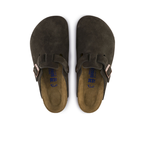 The BIRKENSTOCK Womens Boston Soft Footbed Suede Leather Mocha clogs feature buckled straps, closed toes, a soft footbed for comfort, and cork soles, shown in dark brown from above.