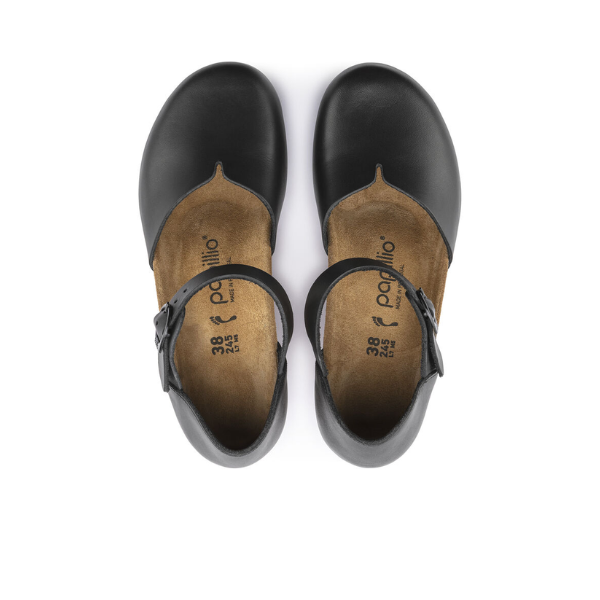 The BIRKENSTOCK Womens Mary Leather Black shoes feature buckled straps, tan insoles, and rounded toes, shown from above on a white background—ideal for foot pain relief and all-day comfort.