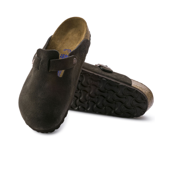 A pair of BIRKENSTOCK Mens Boston Soft Footbed Mocha clogs, one upright and one on its side showing the textured black sole, adjustable buckles, and signature soft footbed.