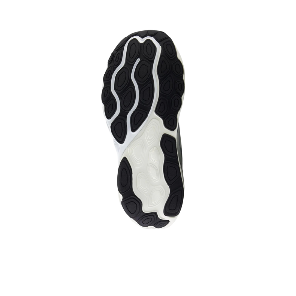 The image shows the sole of the New Balance Womens Fresh Foam 860v14 Running Shoe, featuring a white base with irregular black rubber grip patterns and highlighting NEW BALANCEs Fresh Foam X technology for enhanced comfort. The background is plain white.