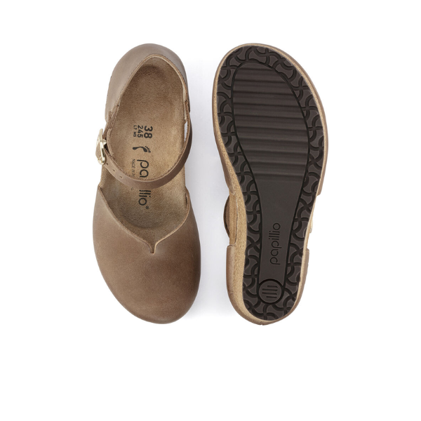 A pair of Birkenstock Womens Mary Leather Cognac shoes by BIRKENSTOCK, featuring a Mary Jane style with a side buckle—one shown from the top and one displaying the sole.