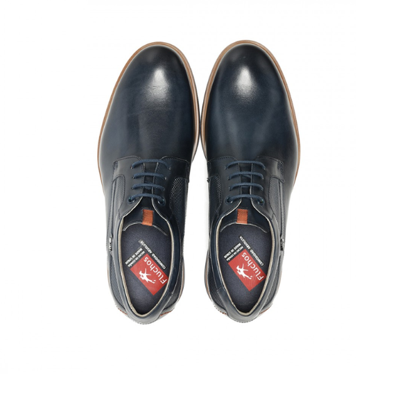 The Fluchos Mens Tristan F1744 Blue by FLUCHOS are navy leather dress shoes with brown soles and laces, insole branded tulson, designed for flexibility and ultimate foot pain relief.